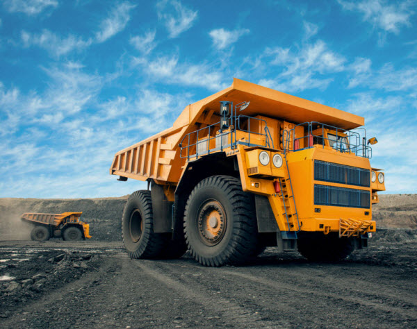 A large quarry dump truck in a coal mine
